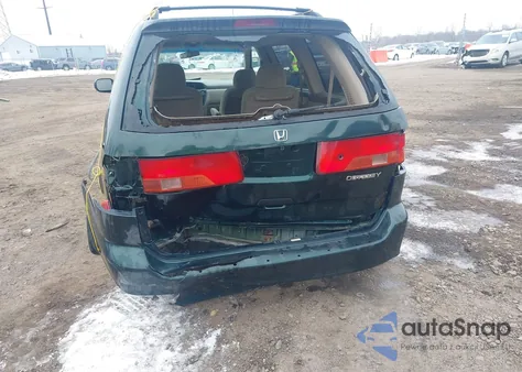 2001 Honda Odyssey Ex z USA, uszkodzony, nr VIN 2HKRL18691H580074